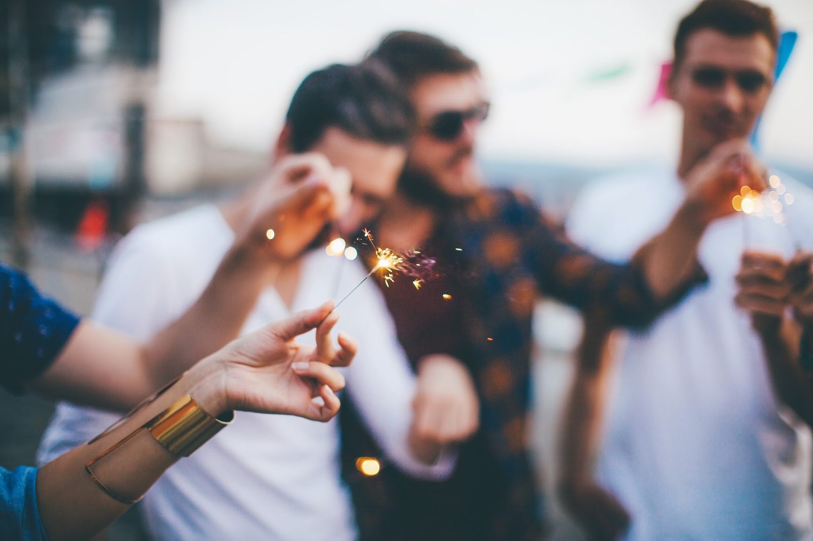 Crowd toasting at a Kava & Company event